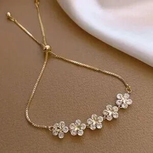 Luxe Gold Tone Rhinestone Flowers Pull Bracelet